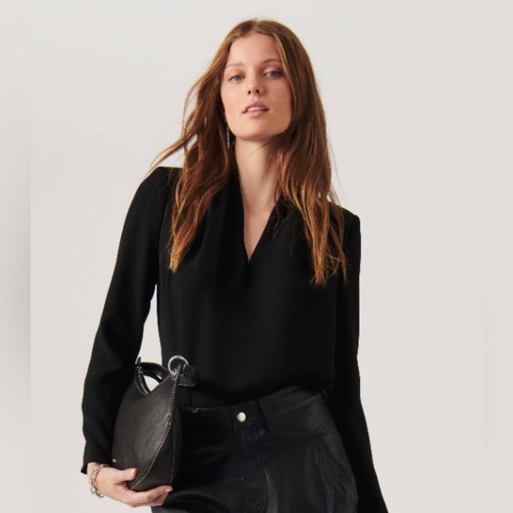 Black long sleeve top.